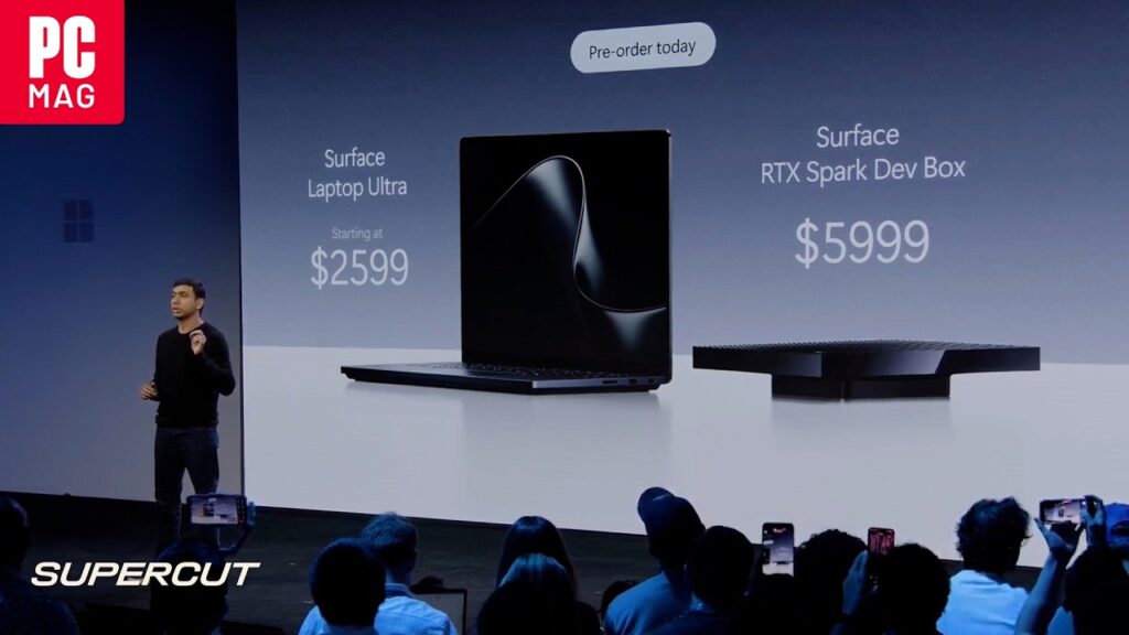 Satya Nadella demonstrating the Surface Laptop Ultra and Windows 11 AI Agent features during a presentation.
